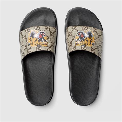 gucci gg supreme tiger slides